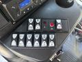 A control panel featuring various buttons for lights and mirrors in a 2020 Chevrolet Express vehicle