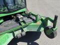 2016 John Deere 1585 Terrain Cut mower with a green frame and a cutting deck featuring a front roller and various controls on the top