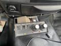 Controls and settings panel for a 2016 RAM 5500 featuring buttons labeled power blast vibrator auger and a knob for overload and jam