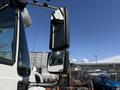 Close-up of a side mirror on a 2008 International 7500 truck featuring a dual mirror setup for enhanced visibility and safety