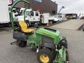 2009 John Deere 2653B Precision Diesel Mower with a yellow seat and green body featuring multiple blades and wheels for cutting grass