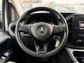The image shows the steering wheel of a 2020 Mercedes-Benz Metris with controls for audio and cruise settings and the Mercedes-Benz logo at the center