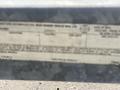 A label with specifications for a 2013 Larson 238 boat model including details like length weight and capacity