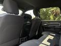 Interior view of the backseat of a 2021 RAM 5500 with two high-backed seats and a center console between them
