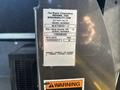 A label on a 2017 Ford Transit-350 showing model number serial number and manufacturing date