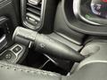 Close-up of the multifunction control stalk in a 2024 RAM 5500 featuring controls for wipers and turn signals