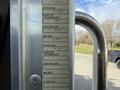 2008 Kenworth T370 showing a pressure information label detailing tire size and ratings for both single and dual configurations