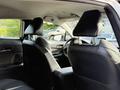 Interior view of a 2021 Toyota C-HR showcasing the back seats and headrests with a focus on the modern design and upholstery