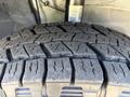 Close-up of a tire tread from a 2020 RAM ProMaster 3500 showing deep grooves and a rugged pattern designed for traction