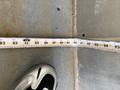 A measuring tape laid out measuring approximately 94 inches with a sneaker partially visible in the frame