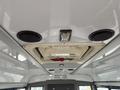 Ceiling interior of a 2021 Ford Econoline featuring speakers a light fixture and a ventilation unit