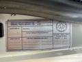Label for a 2014 International TerraStar truck detailing its specifications and manufacturing information including weight ratings and vehicle type