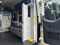 2020 Mercedes-Benz Sprinter 2500 interior with open side door showing seating area and storage compartments