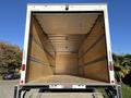 A 2022 Lion Lion6 truck with an empty cargo area featuring wooden walls and a smooth wooden floor