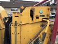 A rusted 2015 Vermeer Corporation BC1200XL with controls and indicators visible on the side
