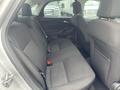 Interior of a 2018 Ford Focus showing the back seat with two headrests and a flat seat cushion in a dark fabric upholstery