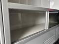 Interior shelf space inside a 2020 Mercedes-Benz Sprinter 2500 van with a metal frame and a smooth white surface