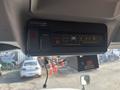 Control panel for lights and warning systems in a 2008 International 4400 featuring buttons and indicators for power and beacon functionality