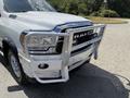 A 2020 Ram 2500 truck with a silver front grille and a chrome bull bar mounted on the front bumper