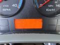 Dashboard of a 2013 International 7500 displaying RPM speedometer and odometer reading of 83295 kilometers
