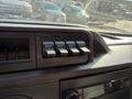 Dashboard controls featuring four auxiliary switches labeled AUX 1 AUX 2 AUX 3 and AUX 4 in a 2012 Ford Econoline E-450