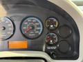 Dashboard of a 2014 International TerraStar showing speedometer tachometer fuel gauge and voltmeter with various indicators and dials