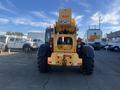 A yellow 2013 JCB 510-56 Loadall with large black tires and a telescopic arm positioned upright