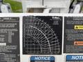 A panel with technical specifications and a load radius diagram for an Altec D3060B attached to a 2013 Freightliner 114SD showing various measurements and warnings