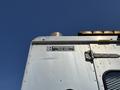 A 2008 Workhorse W62 truck viewed from an angle showing its metallic body and a logo for Intercontinental Truck Body