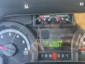 Dashboard of a 2012 Ford Econoline displaying fuel level temperature gauge and odometer reading 232337 kilometers