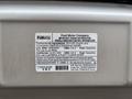 Label detailing engine information and emission control for a 2014 Ford E-350 vehicle including specifications and regulatory compliance