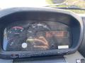 Dashboard of a 2014 Hino 195 displaying speedometer and various gauges including RPM and fuel level