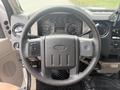 View of the steering wheel and dashboard of a 2008 Ford F-550 showing various gauges and controls