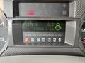 Dashboard display of a 2009 Ford F-450 Super Duty showing trip information and fuel requirements