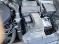 2018 Hyundai Santa Fe engine compartment showing components like the air filter battery and various hoses and wiring