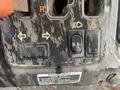 Close-up of control panel for a 2010 Kubota RTV 900 featuring various buttons and levers for operation