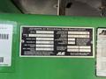 A manufacturer label for a 2015 JLG 450AJ aerial work platform displaying model specifications and operational details