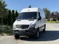 A white 2017 Mercedes-Benz Sprinter van with a high roof and front grille featuring the Mercedes logo