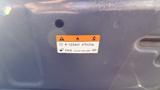 Label on the underside of a 2018 Hyundai Sonata containing warning symbols and information about the vehicle