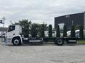 A 2020 Lion Lion6 truck with a white body and a flatbed chassis designed for electric commercial use