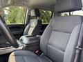 Interior view of a 2017 Chevrolet Silverado 1500 showing front seats and center console with fabric upholstery