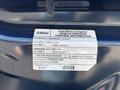 A vehicle emission information label for a 2016 Ford Transit 150 detailing EPA regulations and compliance for gasoline engines