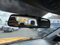 A 2017 Ford F-250 SD is visible in the rearview mirror of the truck with its interior dashboard and controls in the foreground