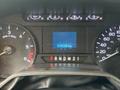 Dashboard of a 2021 Ford Econoline showing gauges for RPM and speedometer along with a digital display indicating 39280 km