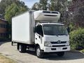 A white 2018 Hino 195 refrigerated truck with a boxy cargo area and a front grille featuring the Hino logo