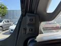 Close-up of control panel with two switches and a red indicator light inside a 2017 Chevrolet Express van