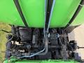 View from above of a 1996 Kenworth T800 featuring various pipes and mechanical components in a green and black color scheme