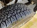 A close-up of a textured tire from a 2023 Mercedes-Benz Sprinter 2500 showing deep grooves and treads designed for traction