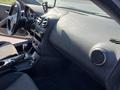 Interior view of a 2006 Pontiac G6 showing the dashboard controls and steering wheel