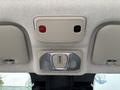 Overhead control panel in a 2023 RAM Promaster 3500 featuring an emergency SOS button and interior lights control